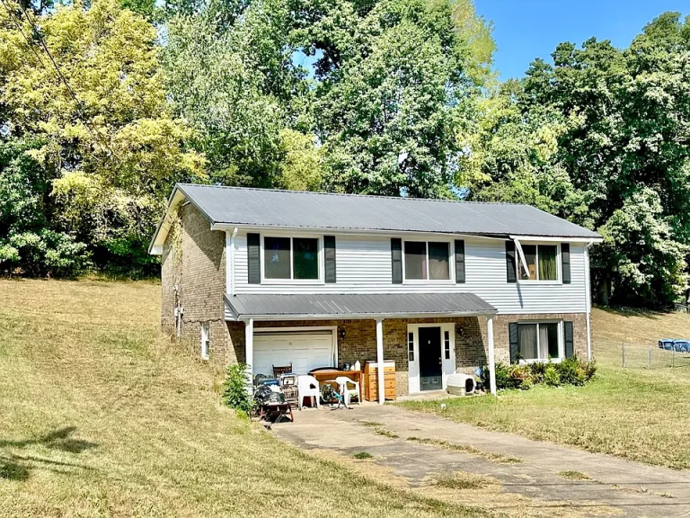 This 3-bedroom, 2.5-bathroom brick and vinyl ranch home offers spacious living areas, including a large bonus room. $50,000