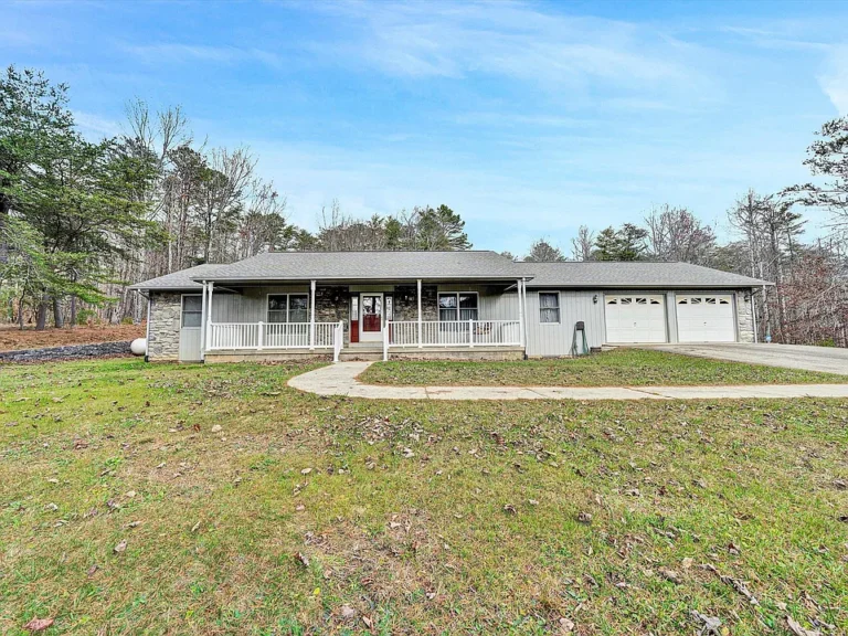 Discover the perfect blend of tranquility and accessibility in this one-level ranch home nestled on 10 serene acres.