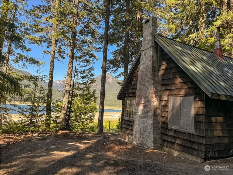 Mountain Getaway: Rustic Cabin with Keechelus Lake Views $99,900