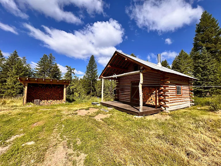 Charming Log Cabin on Wooded Acreage $169,900