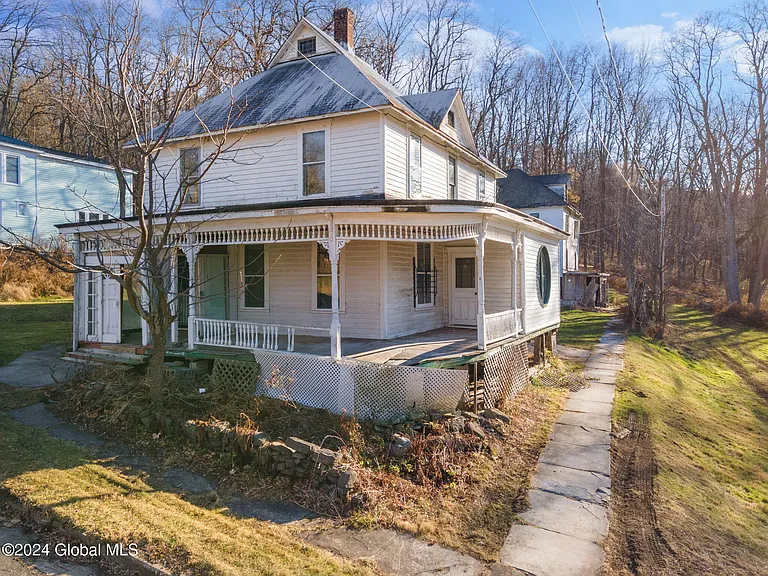 Historic Victorian Home with Redevelopment Potential  $99,000