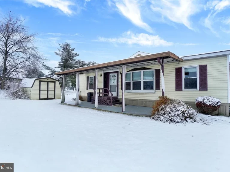 Spacious Mobile Home with Private Primary Suite & Covered Porch: Convenient Living! $66,750