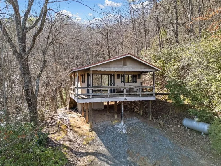 This charming 2-bedroom, 1-bathroom cabin nestled on 2.52 serene acres offers the perfect blend of privacy and convenience. $174,900