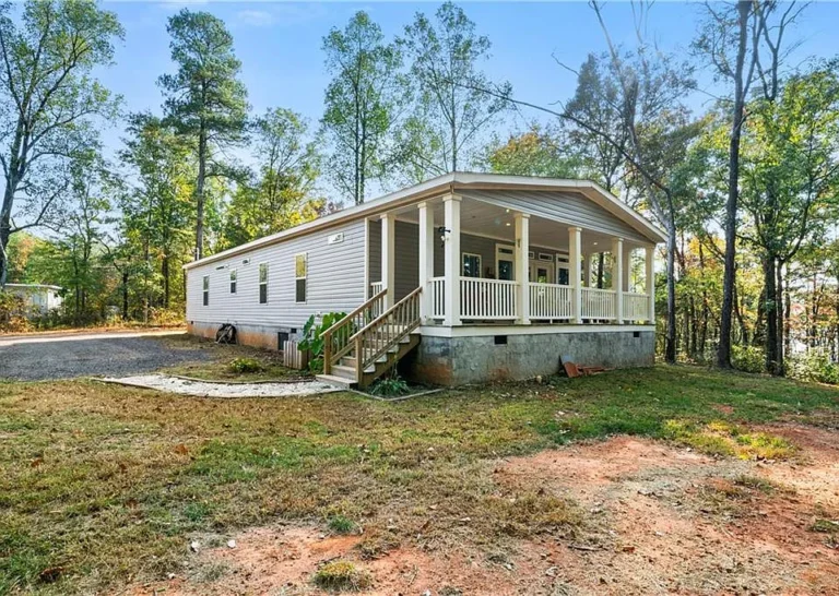 Country Living on 5 Acres: Mountain Views & Redevelopment Potential $180,000