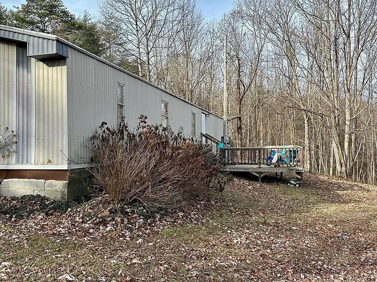 Motivated Seller: 1992 Singlewide on 5.51 Acres with Investment Potential! $99,000