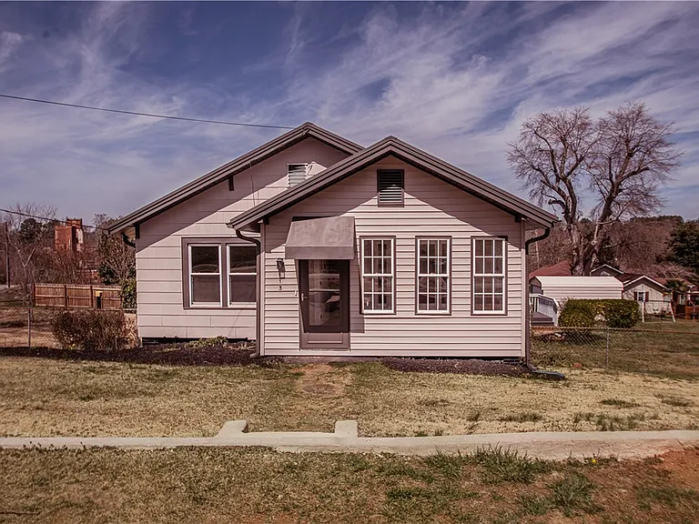 This renovated charmer still FEELS like walking into Granny’s house! $194,900