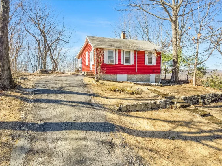 Nestled in the tranquil hills of Lake Peekskill, just over an hour from NYC, this charming home offers the perfect blend of a peaceful retreat and modern convenience.