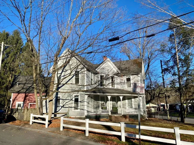Spacious 1800s Home with Office Space, Historic Charm, and City Convenience $255,000