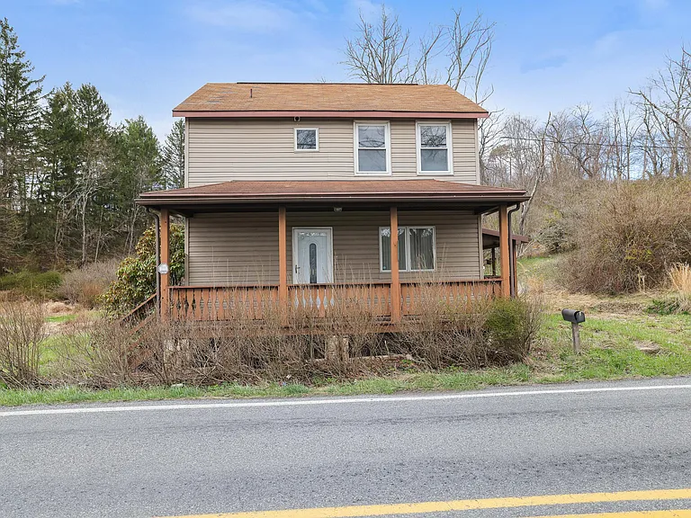 Do Not Wait to See this Circa-1858 Farmhouse Opportunity on 2.25 Scenic Acres Near Lehighton! $129,000