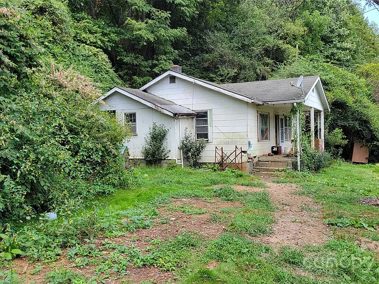 “Secluded 14-Acre Property with River Frontage and Endless Potential – AS IS Sale”