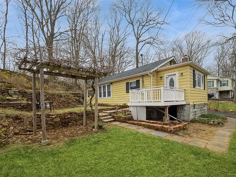 Fall in love with this charming 2-bedroom, 2-bath retreat nestled on a tranquil lot in a peaceful Lake Carmel neighborhood.