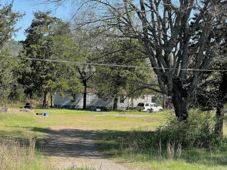 2-Bedroom Mobile Home with 10.88 Acres for Sale in Boles, Arkansas
