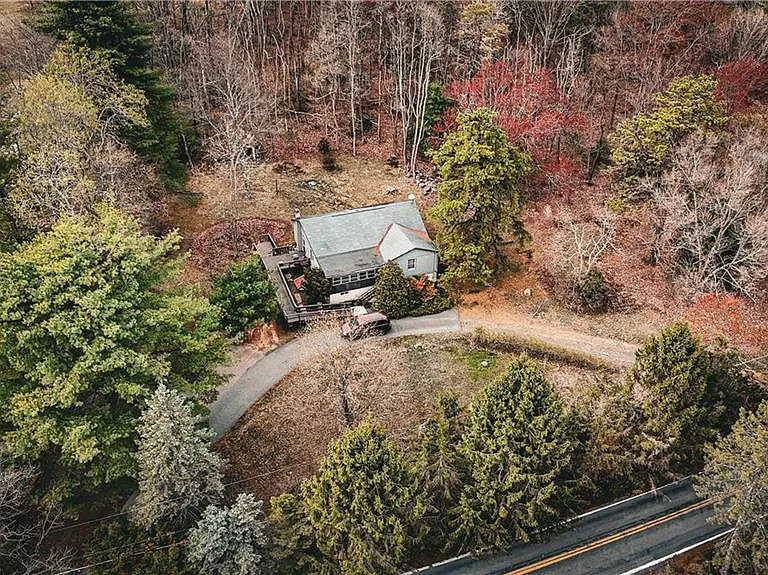 Have you always wanted to own a home on a hill with an amazing view and acreage? $190,000