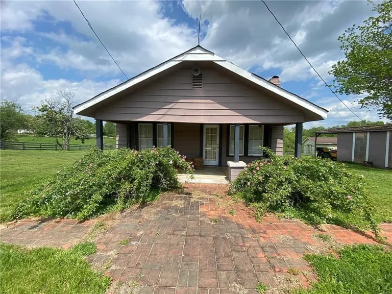 Two Homes on One Acre Lot – Historic Property with Endless Potential! $199,900