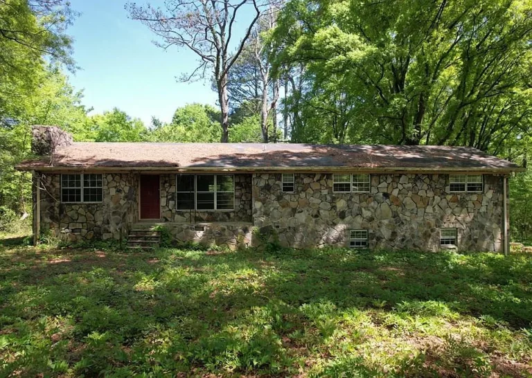 2.89 Acres with Stone Ranch Home $125,000