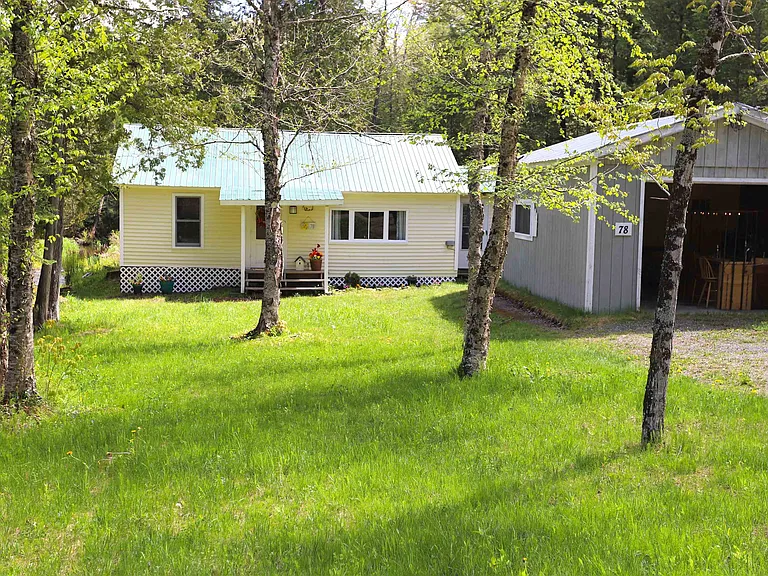 Just in time for summer! This furnished 2 bedroom seasonal camp within eye sight of Daniels Pond is for sale. $124,900