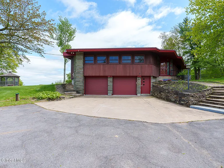 VIEW-TI-FULL! Pond and a long winding driveway welcome you to this striking, mid-century one-of-a-kind Contemporary hilltop Ranch on 7.22 acres $439,800