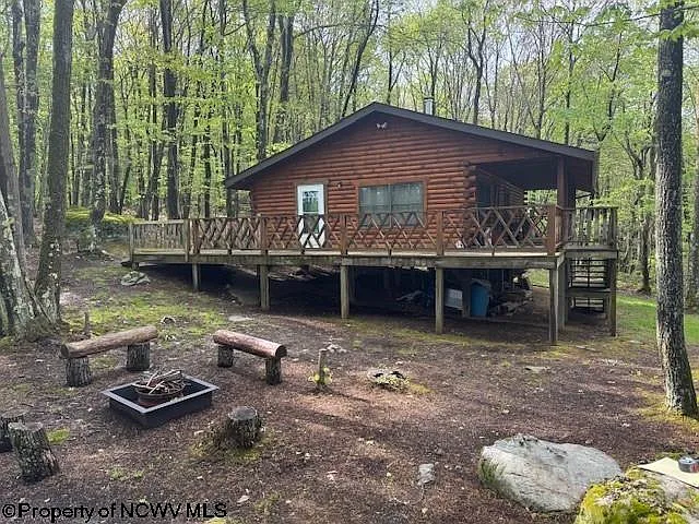 Welcome to your own slice of WV mountain paradise! Nestled on a breathtaking 34.4 acres of lush timberland, $299,000