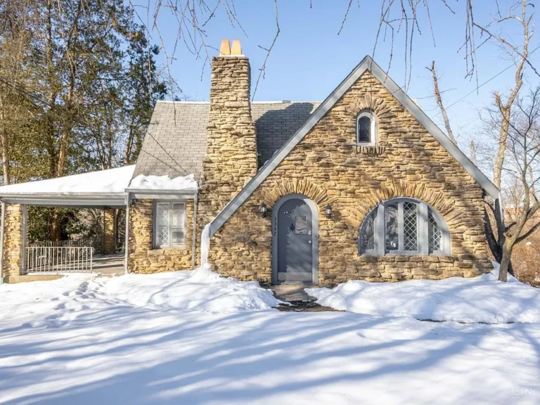 Discover classic charm and modern comfort in this stunning 4-bedroom stone Tudor-style home, beautifully situated on 0.86+ private acres—ideal for family fun, gardening, or peaceful outdoor living. $239,900