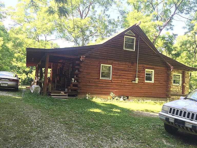 3 Bed Rm, 1 1/2 Bath – Log cabin look at feel, nested back in a hollow with 3 ponds just yards away, $220,000