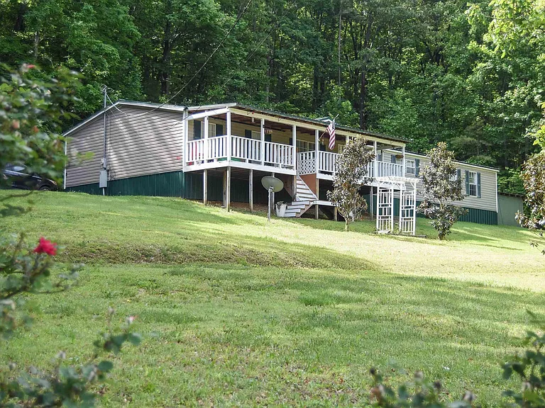 Welcome to peaceful country living! This spacious mobile home offers over 2,000 square feet of comfortable living space, all nestled on 8.6 serene acres.$249,900