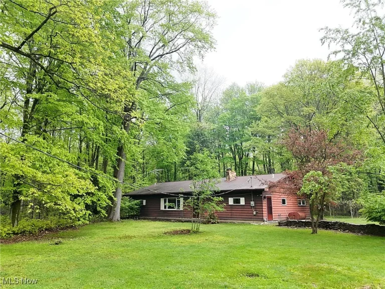 Charming Ranch Home on 9 Wooded Acres with Detached Garage & Cabin Sauna $235,000