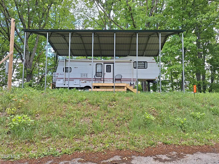 This is your chance to own a mountaintop retreat on a ridgetop known as …$99,900