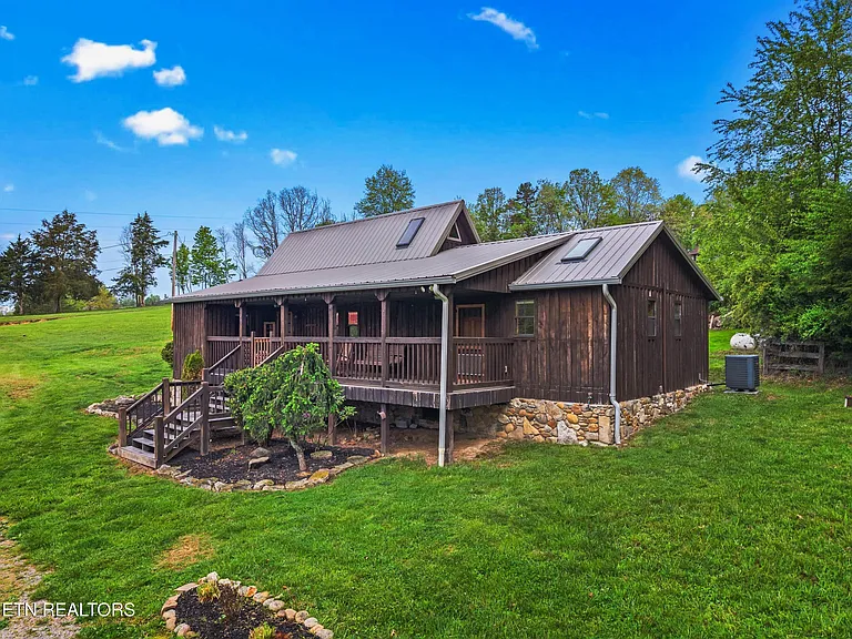 265 Martin Carmack is a charming, cottage-style single-family home offering a peaceful blend of country living and modern comforts. $250,000