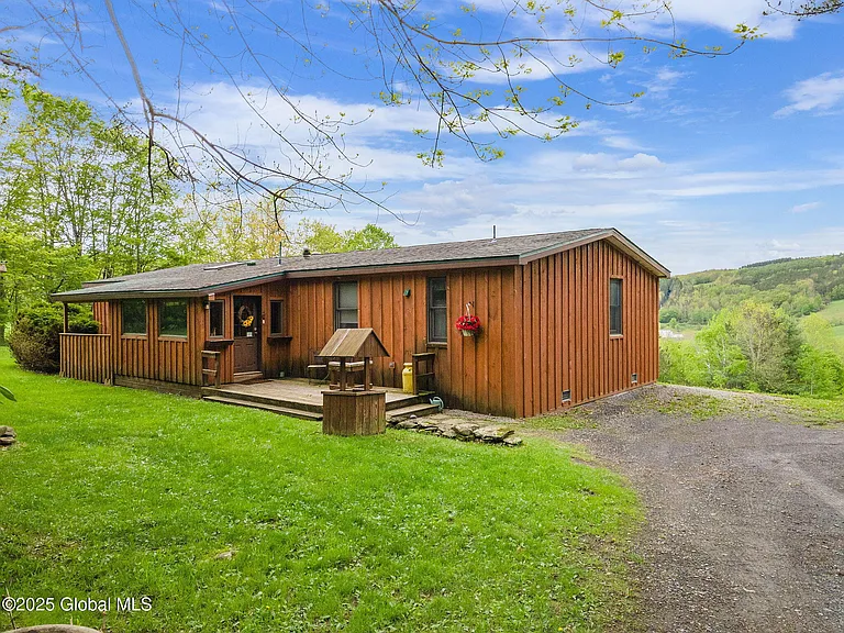 This 3-bedroom, 2-bath ranch sits on a picturesque treelined 6.5 acre lot. $269,900