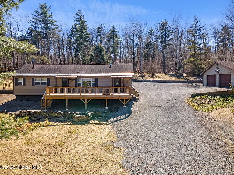 3 bedroom, 2 bath house in excellent condition. Detached 2-car garage. Beautiful back deck overlooking the property and pond. $199,000