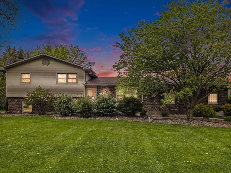 Peaceful Country Living Near It All – Spacious Quad-Level on Nearly 1 Acre! $285,000