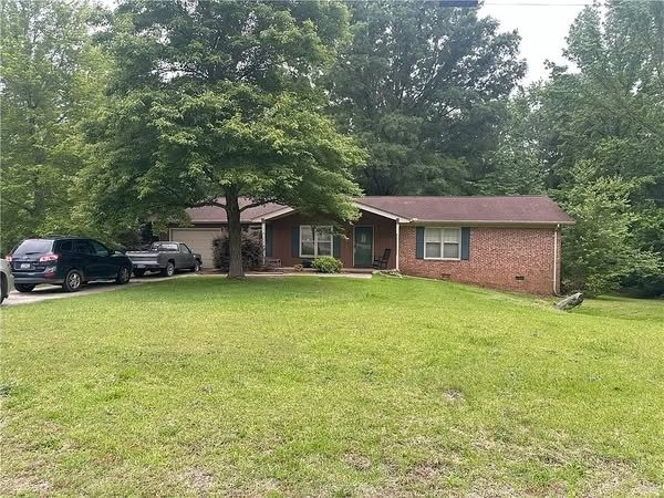 Charming 3-Bedroom Brick Home with Fireplace and Fenced Yard in Avondale, Greenwood