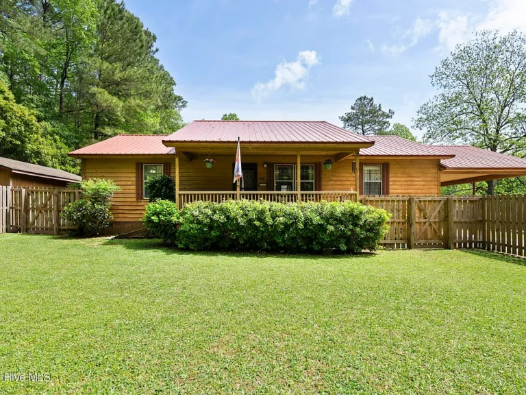 Tucked away on a generous 0.6-acre lot surrounded by mature trees, this charming 3-bedroom, 2-bathroom home offers the perfect blend of peaceful seclusion and urban convenience. $244,900