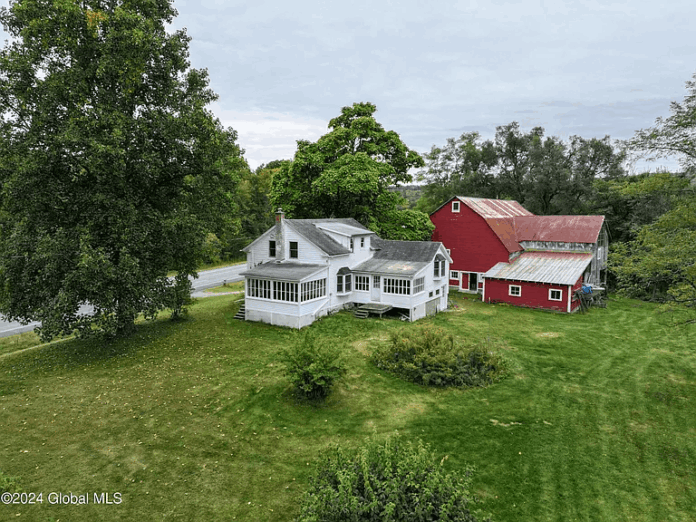 401.5-Acre Property with Historic Farmhouse and Mountain Views in a Scenic Rural Setting