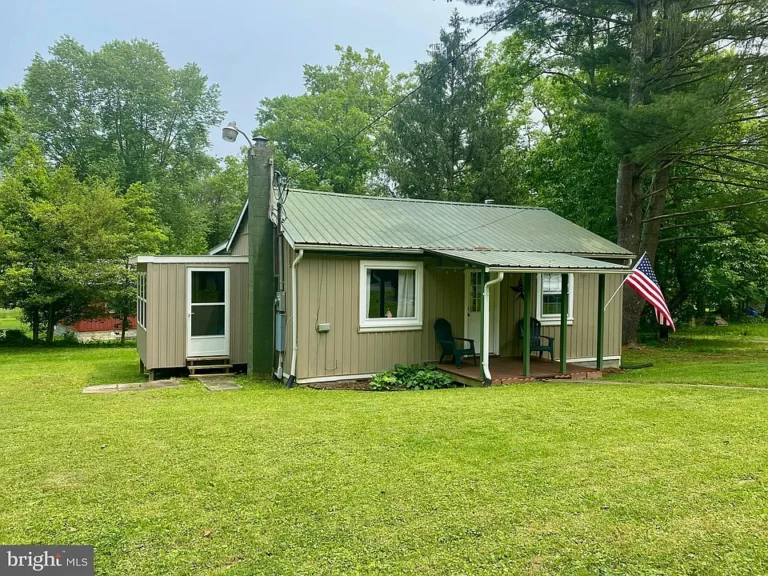 Summer Starts Here! Cozy Cabin Retreat on the Cacapon River $65,000