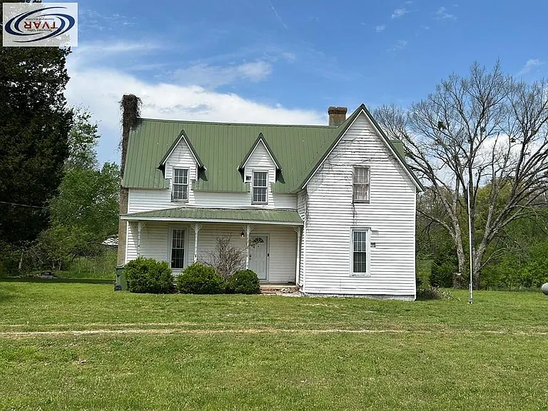 “Restore the Past: A Charming Early 1900s Home on 5.5 Acres of Potential”