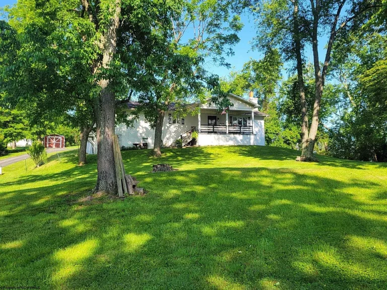 Spacious 4-Bedroom Home on .71 Acres – Privacy & Convenience Combined! $249,000