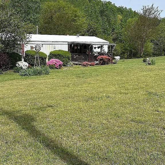 Come live in the country with beautiful views of the mountains you get all 4 seasons, views of sunsets, deer, beautiful trees and bushes, $163,000