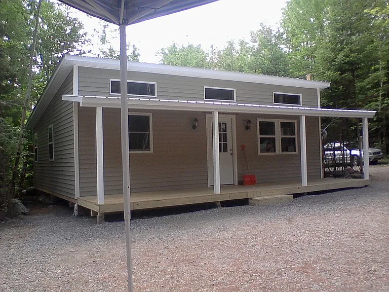 4-season private camp built 8 years ago. 4 season paved road access. $199,750