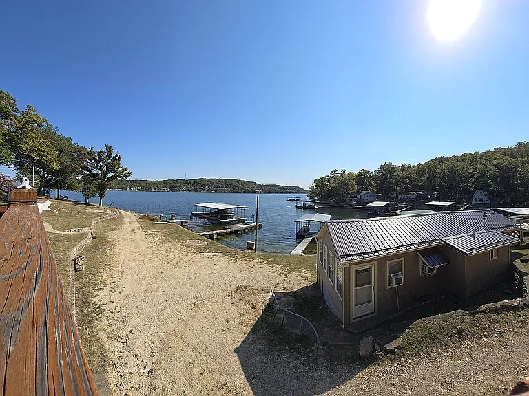 This is a great Lake of the Ozarks home. It has 2 bedrooms, 1.5 baths, and is on the 5.5 Mile Marker of the Gravois Arm. $184,500