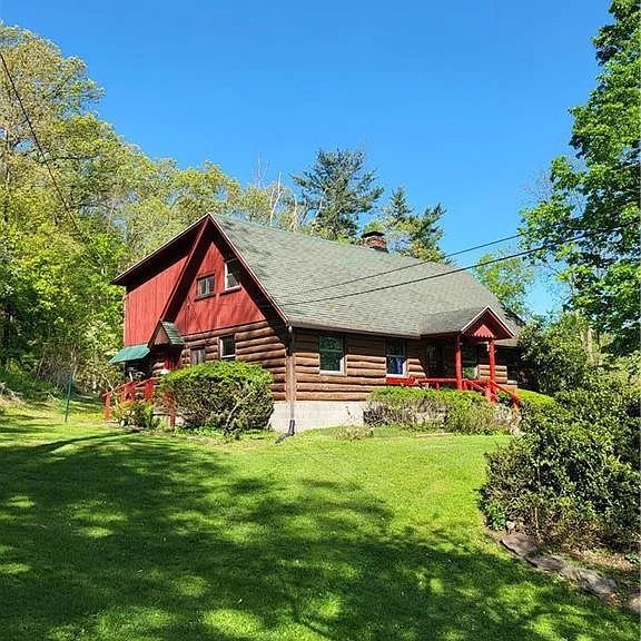 Charming Log Cabin on Scenic Lot – Cozy Living for $220,000