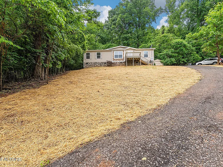 Perched on a hillside with sweeping views, this beautifully updated 3-bedroom, 2-bath offers the perfect blend of comfort and convenience. $179,900