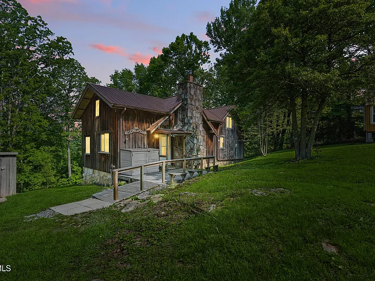 Fully Furnished-Big Cherry Lake cabin! Serene and private, this is the perfect chalet for a year around retreat. $179,000
