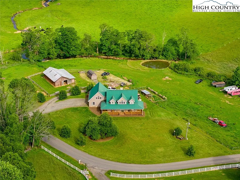 Welcome to this charming and spacious 2-story farmhouse, situated on 5+ acres of picturesque land with pasture,