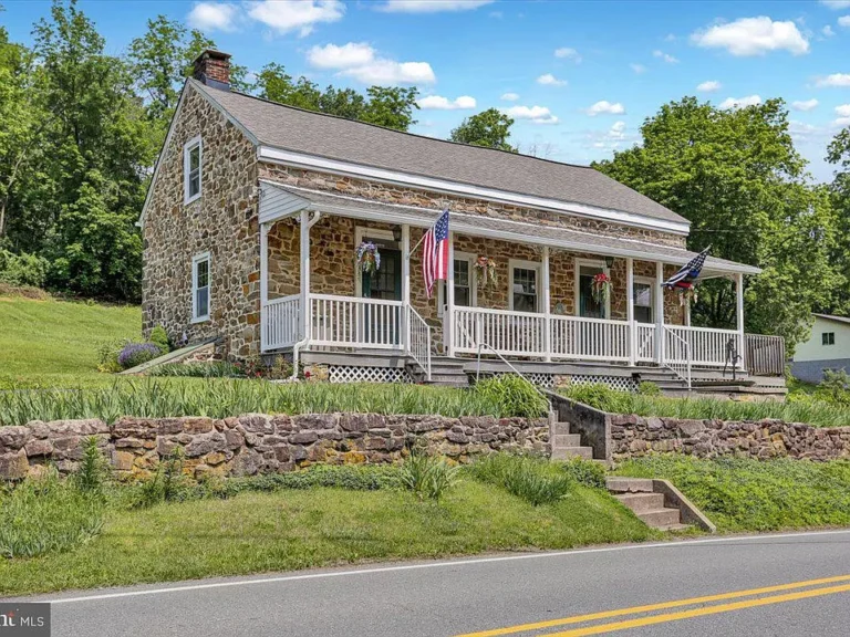 1124 Fairview Drive – A Timeless Stone Farmhouse Full of Charm and Possibility $279,900