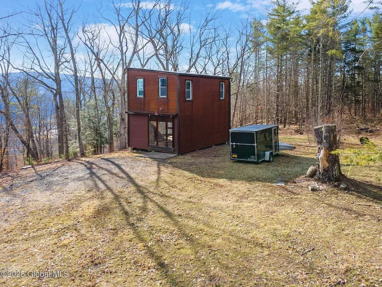 One-of-a-Kind Retreat on 13.46 Acres with Private Pond & Two Homes $175,000
