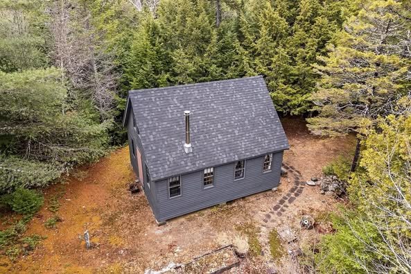 Off-Grid 2-Bedroom Cabin on 3.55 Acres with Stream Frontage in Amherst, Maine