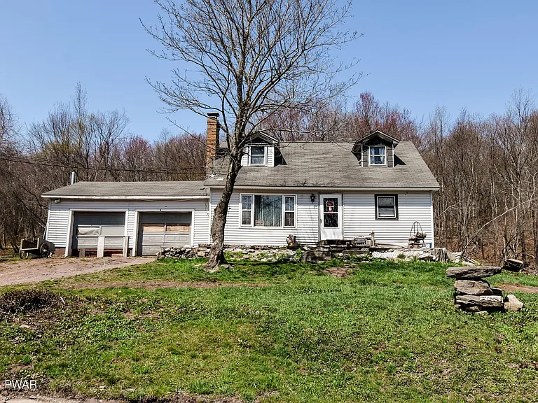 Bring your vision and tools to this 4-bedroom, 2-bath home set on 5 peaceful acres in Forest City. $135,000