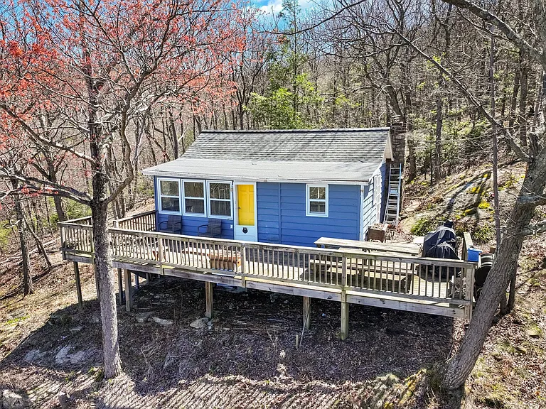 If you are seeking a peaceful retreat, surrounded by forest and magnificent views of mountains and setting sunsets, $289,000