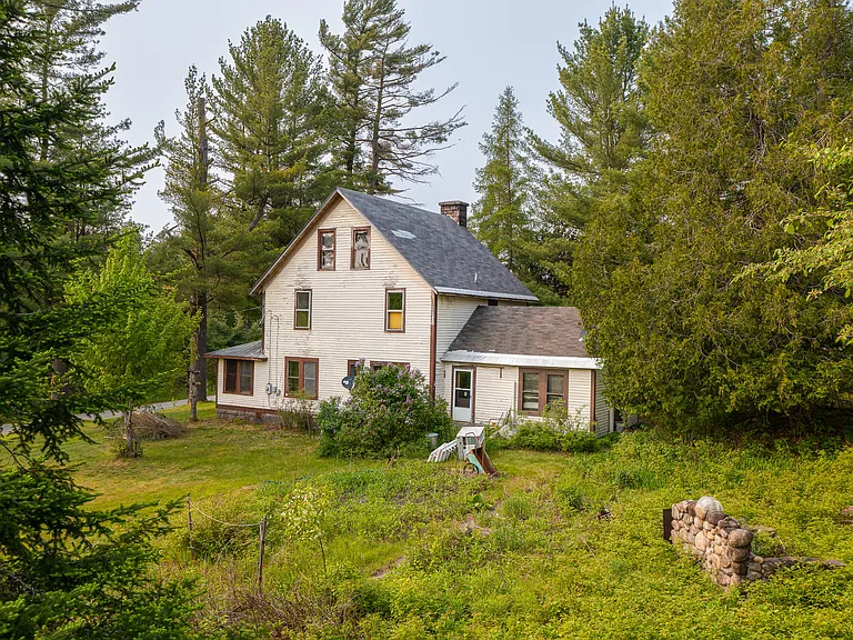 This spacious 5-bedroom house was built well in 1903 and the bones are good until now. $199,000